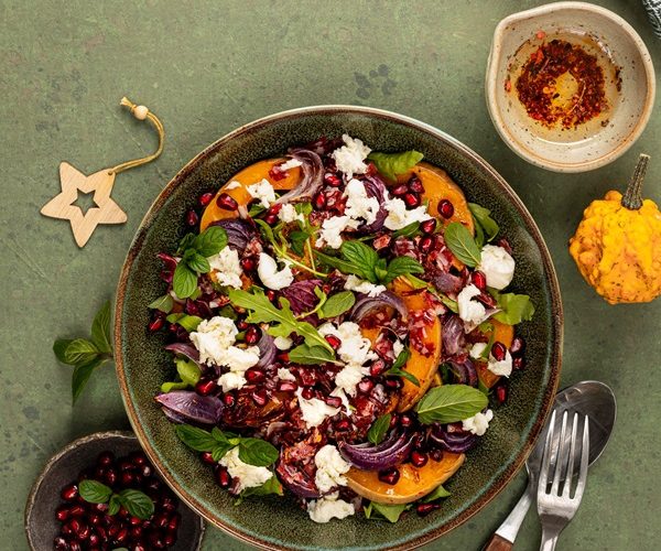 warm-winter-quinoa-salad-with-pumpkin-chorizo-mozzarella-arugula-leaves-pomegranate-min